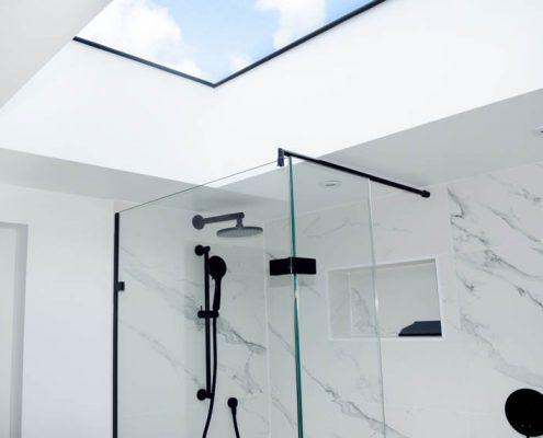 large skylight window to bathroom in loft